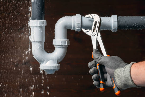 Professional Drain Cleaning technician working in Ames, TX